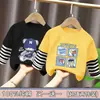 Camiseta de manga larga para niño, nuevo modelo primavera y otoño 2026, top estiloso para niños, camiseta base de moda de imitación de dos piezas para niños mayores