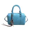 Bolsa feminina de alta qualidade, moderna e minimalista com um design único; uma bolsa de ombro versátil, uma bolsa quadrada pequena estilo Boston e uma bolsa transversal