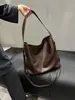 Bolso de hombro de piel de vaca simple y versátil para mujer, bolso tote de gran capacidad para el día a día, bolso de axila de alta gama, nuevo bolso para mujer 2026