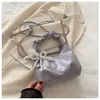 Bolso de Mano Pequeño Plateado Plegado para Mujer Verano 2025 Nuevo Bolso Dumpling Dulce Tira Colgante Bolso Cruzado para el Trabajo Moderno