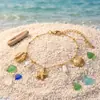 Pulsera Taina estilo oceánico de acero inoxidable transfronteriza europea y americana para mujer con estrella de mar, conchas, perlas, circonita en forma de corazón y diseño de cadena de tenis