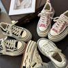 Sapatos de lona pretos de sola grossa de nicho para mendigo femininos 2025 primavera e outono novos sapatos plataforma de sola grossa versáteis casuais tênis de skate