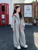 Conjunto de roupa de outono e inverno para meninas 2026 novo conjunto esportivo casual estiloso e moderno de duas peças para crianças mais velhas moda transfronteiriça