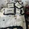 Bordado de toalha em renda e laço estilo francês, conjunto de quatro peças em algodão lavado, com estética feminina, incluindo uma capa de edredom e um conjunto de três peças de lençóis para quartos de dormitórios
