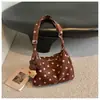 Bolso de hombro de lunares estilo coreano para mujer, nuevo modelo 2026, bolso tote de gran capacidad para el día a día, bolso cruzado simple y versátil