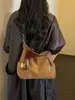Bolsa feminina de grande capacidade transfronteiriça 2026 nova bolsa transversal estilo nicho para estudantes universitários bolsa de ombro bolsa tote para o dia a dia