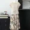 Conjunto de Duas Peças com Saia de Chiffon para o Verão da Mamãe 2026 Novo Estilo Blusa de Verão para Mulheres de Meia-Idade Estiloso e Elegante