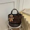 Bolsa de cubo de moda retro de alta gama 2026 transfronteriza, bolso de mano versátil casual, bolso de hombro, bolso cruzado