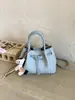 Bolso de Mano Tejido a Mano de Nicho Coreano para Mujer 2026 Nuevo Estilo Primavera Bolso Tote Cesta con Acabado de Alta Gama, Diseño Acolchado de un Solo Hombro