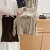 Limón Salado SevenSo Coreano! Conjunto de otoño para niña: cárdigan de punto suave y acogedor, top sin mangas floral con volantes y pantalones de campana