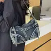 Bolso de mezclilla para mujer, nueva moda casual de verano de tendencia 2026, adecuado para la escuela y el trabajo, versátil bolso de hombro y bolso cruzado