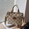 Bolsa Tote de Mão Simples e Fashion Nova Verão 2026 Grande Capacidade Estilosa Simples Casual Personalidade Bolsa de Ombro para Mulheres