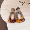Pendientes de borla con carcasa de madera marrón transfronterizos europeos y americanos, pendientes de estilo vintage Maillard, pendientes de mujer de lujo ligero de alta gama