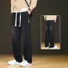 Venta al por mayor de fábrica transfronteriza Jeans de pierna recta para hombre de primavera y otoño Marca de tendencia americana Pantalones largos casuales holgados de pierna ancha