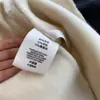 Tela suministrada por el cliente, abrigo de doble cara, lana de alpaca, seda, abrigo con capucha de lana, abrigo corto de lana para mujer L0901Y