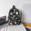Transfronterizo 2024 nueva mochila diaria graffiti lindo dibujos animados animación estudiantes de primaria y secundaria bolsa de hombro de gran capacidad venta al por mayor