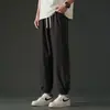 Bolsa de cintura cruzada Amazon Explosions Cintura Rota Borde Rasgado Amoníaco Elástico en Cuatro Lados Seda Helada Pantalones de Nueve Puntos Estilo Hong Kong para Hombre Sueltos Elásticos