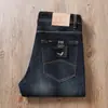 Estação europeia jeans branco de alta qualidade masculino outono e inverno grosso clássico casual elástico solto reto calças lavadas