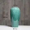 Cerâmica Jingdezhen Verde Luz Luxo Alto Padrão Vaso Retro Novo Estilo Chinês Hotel Quarto Modelo Simples Arranjo de Flores Ornamento