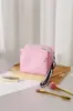 Bolsa de maquillaje simple a rayas bicolor, portátil y artística, adecuada para viajes, almacenamiento de productos para el cuidado de la piel, bolso de mano, bolsa tipo almohada