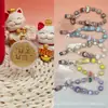 Colgante pequeño de oro puro 999 "Te amo por diez mil años", serie Labubu, con cordón para colgar, un regalo promocional para tiendas de oro