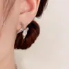 Pendientes de serpiente con microincrustaciones de circonita, diseño de moda de nicho, con personalidad única, aguja de plata S925, exquisita y versátil joyería para las orejas.