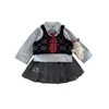 Conjunto de Estilo Universitario para Niñas Otoño 2026 Chaleco de Punto para Niños Camisa Top Falda Plisada Conjunto de Tres Piezas Moderno