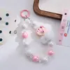 Nueva colección de otoño e invierno: Lindos dijes para teléfono de pompón pintados a mano estilo caricatura, accesorios de moda y exquisitos para bolso y llavero, perfectos como regalo