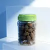 Fabricante Fornece Garrafas Quadradas de 850ml com Tampas Portáteis, Garrafas para Alimentos com Boca de 88mm e Garrafas Plásticas para Embalagem Selada de Nozes