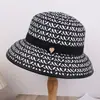 2025 nuevo sombrero de paja plegable para viajes al aire libre con ala ancha, etiqueta de corazón, simple, anti-ultravioleta