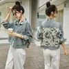 Chaqueta de mezclilla con patchwork de pintura a tinta estilo chino nuevo para mujer, nuevo modelo primavera y otoño 2025, estilo chino ligero, chaqueta súper elegante para mujeres petite