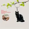 Novo Pingente de Gato Preto Acrílico Transfronteiriço Plano Decoração de Interior de Carro Espelho Retrovisor Chaveiro Ornamento Pendurado Decoração de Carro