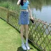Mini Saia Jeans de Cintura Alta para Mulheres Primavera e Verão 2025 Novas Saias Shorts Culottes Sexy Petite Saia Evasê no Quadril