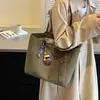 Bolso de Gran Capacidad para Mujer 2026 Nuevo Otoño/Invierno Tacto de Alta Gama Estudiante Universitaria Bolso de Hombro Único para Clase Bolso Tote para Viajar