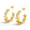 Aretes transfronterizos de acero inoxidable de moda europea y americana con florecitas de margarita geométricas de acero de titanio con textura de oro de 18k para mujer