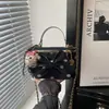 2026 Nuevo Bolso de Mano con Cadena Alta Apariencia Lunares Bolso de Hombro para Viajes Diarios ins Moda Personalidad Simple Elegante