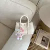 Bolso tipo cubo simple y elegante para mujer, estilo coreano, adecuado para el trabajo y para ir al trabajo, bolso de hombro, nuevo bolso cruzado de moda 2026 para mujer