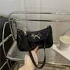 Bolsa de axila com laço super popular 2025, bolsa de ombro de axila em PU moderna e estilosa, bolsa pequena, bolsa de axila de venda quente transfronteiriça