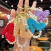 2026 Novo Modelo Sapato de Salto Alto Feminino com Argila e Strass Chaveiro Corrente de Pérolas com Strass de Alto Valor Pingente para Bolsa Feminina