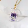 Colar de Flor de Amor-Perfeito Bicolor Nova Fronteira Amazon Criativo Feito à Mão Resina Flor Seca Pingente Joias Fábrica Atacado