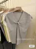 Camiseta de punto de seda helada acanalada retorcida con cuello en V de manga corta para mujer, nuevo estilo de verano 2026, adelgazante, elegante, versátil, top ligero