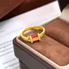 Anillo de cobre bañado en oro vietnamita, estilo familia Zhou, serie "Chuanxi", incrustado con diamantes, esmalte, carácter rojo "Felicidad", diseño de diamantes, venta al por mayor