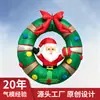 Decoraciones navideñas transfronterizas: Papá Noel inflable para exteriores asomándose desde una corona con luces LED integradas, modelo de aire para decoración de ventana