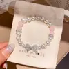 Pulseira de Pérolas com Laço de Zircônia Doce Pulseira de Personalidade de Alto Padrão Nicho Joia de Mão Simples Exquisita de Luxo Leve