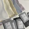¡Artículos de calidad de las Trece Líneas de Guangzhou! Camiseta básica top de otoño 2026, corte ajustado, realza la clavícula, superelástica, suave