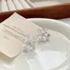 Pendientes de Flor de Esmalte con Circonita de Lujo Nicho 2026 Nuevos Pendientes de Plata con Aguja de Moda con un Ambiente Elegante para Mujeres