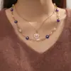 Collar Sencillo y Versátil Corazón de Amor Ojo del Diablo para Clavícula para Mujer, Cadena de Clavícula Transparente de Hilo de Pescar Multiestilo Creativa y de Moda