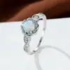 Deseo transfronterizo Anillo de flor de encaje de cuatro garras Aobao AliExpress ronda cuatro anillo Joker para mujer al por mayor