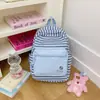 Mini mochila edición limitada de verano con rayas azules y pequeños lunares, refrescante y juvenil, perfecta para salidas de chicas y sesiones de fotos