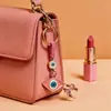 Colgante de Serie Ojo de Diablo Transfronterizo Europeo y Americano Colgante de Llavero de Joyería de Animales Ojo de Hueso con Goteo de Aceite Accesorios de Aleación para Mujeres